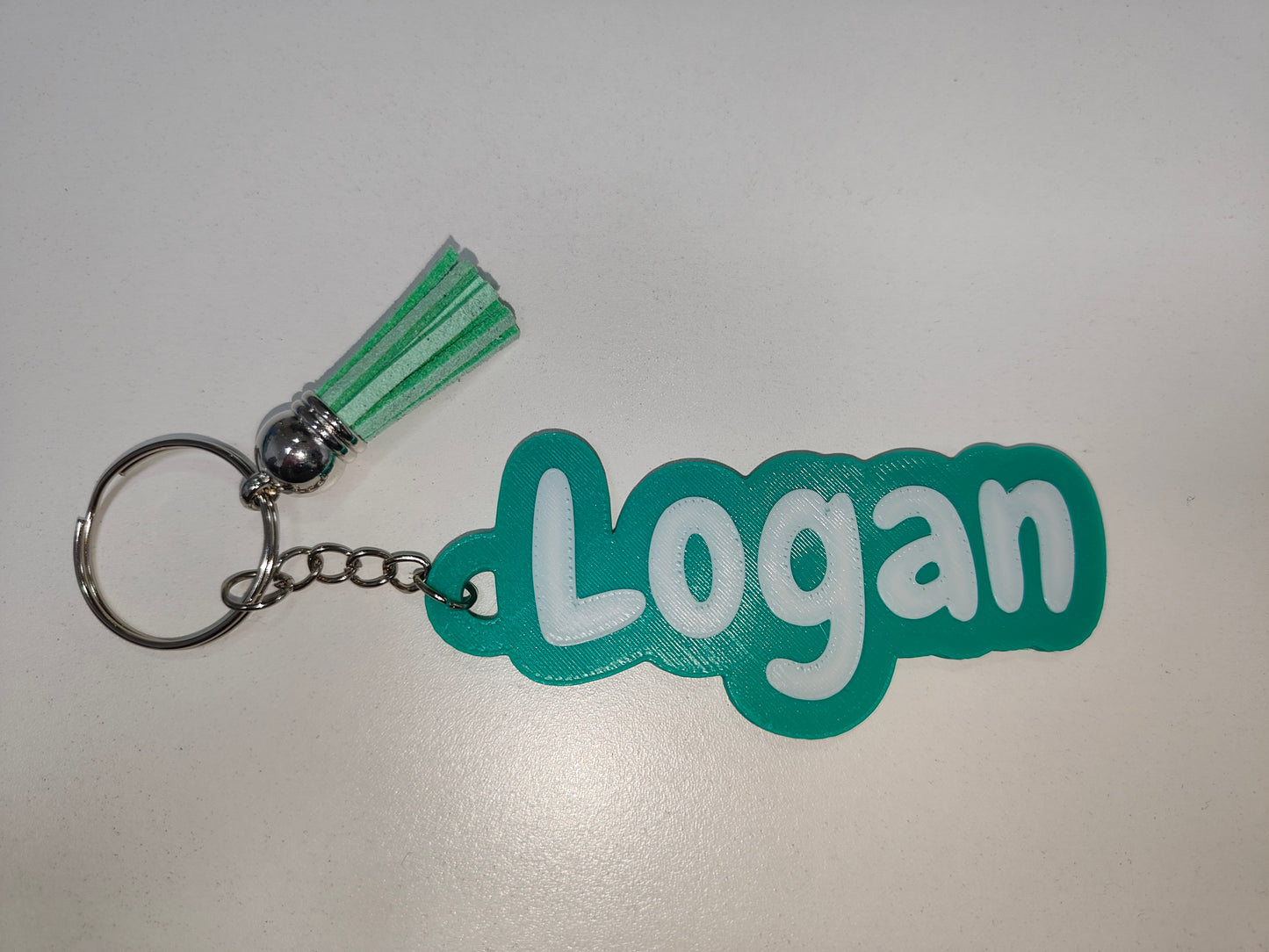 Llaveros 3D con nombre a dos colores